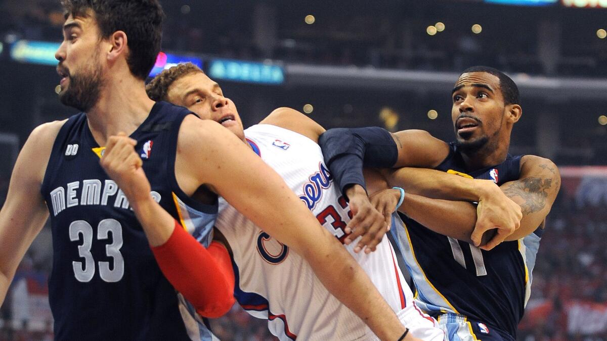 Blake Griffin tangles with Grizzlies' Marc Gasol, left, and Mike Conley Jr. during Game 5 of the NBA playoffs at Staples Center in 2013.