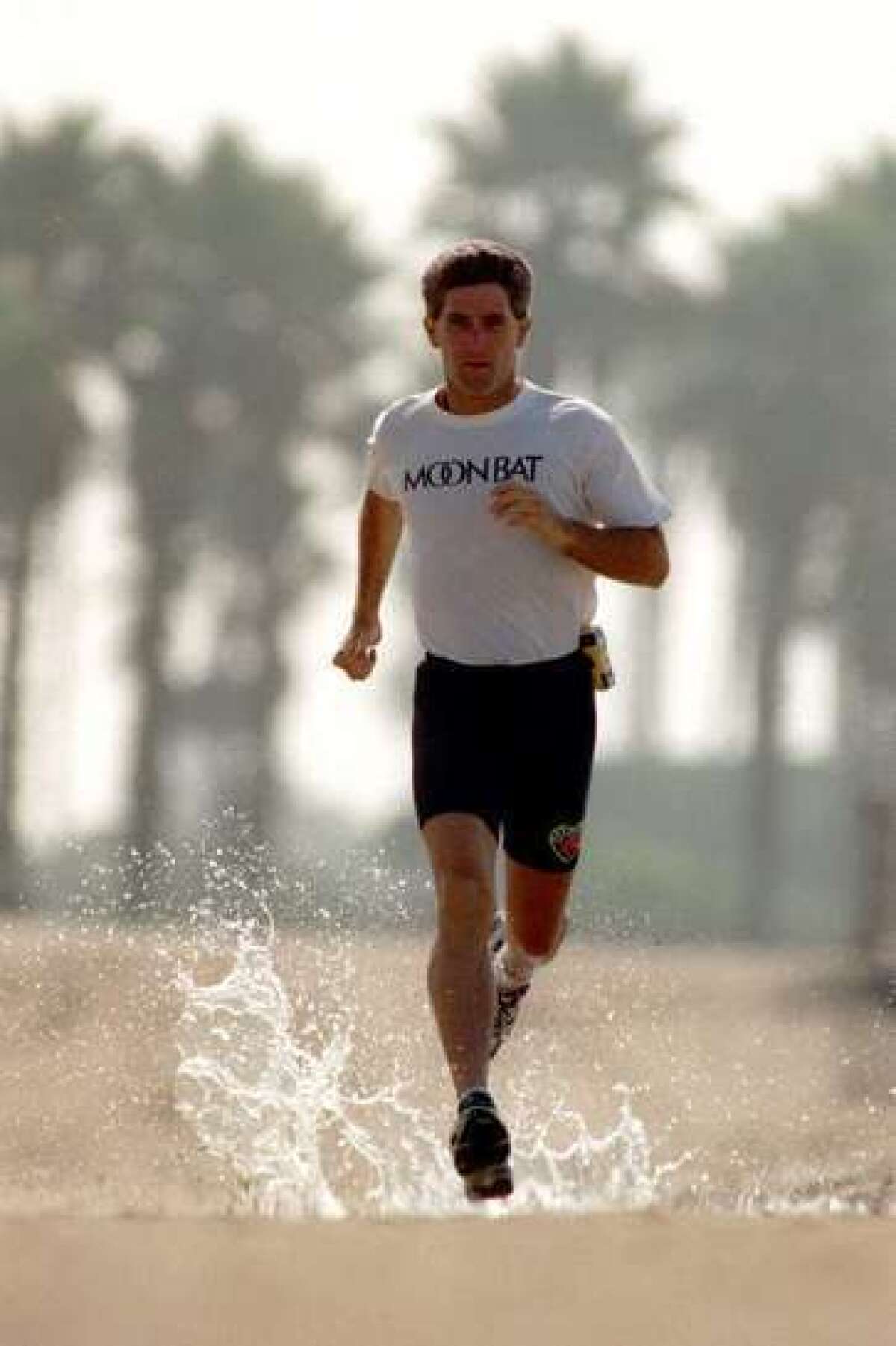 Edward Kelly of Newport Beach, running along Pacific Coast Highway, is one of the best ultra-marathoners in the world.
