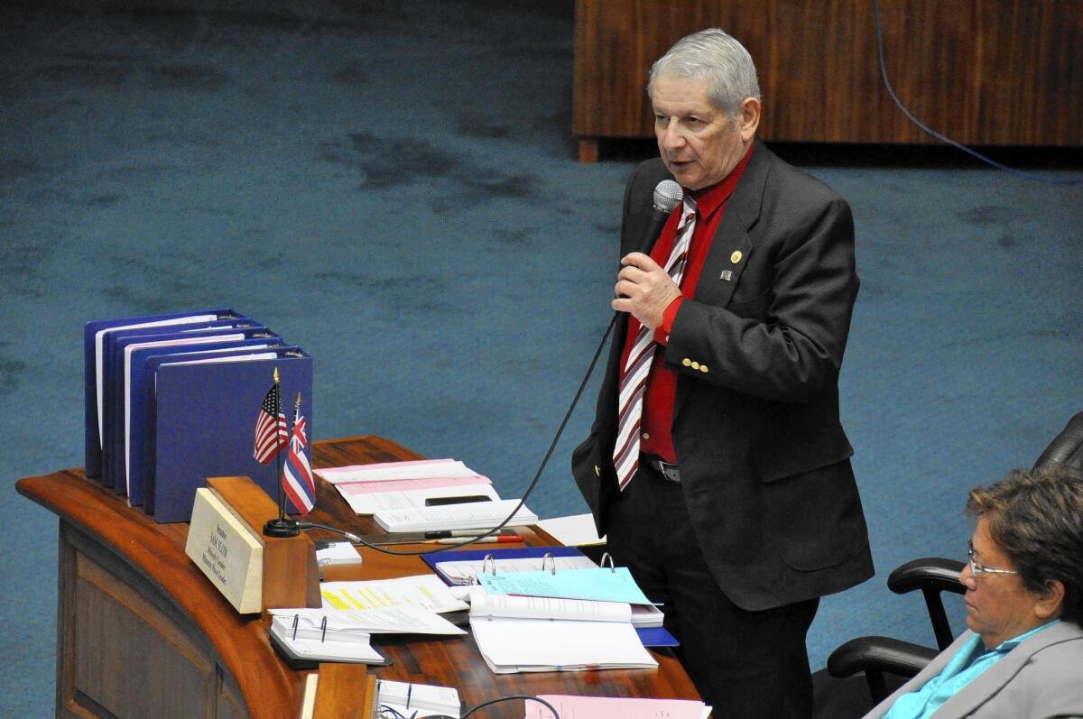 Hawaii Sen. Sam Slom, the lone Republican member, speaks in the Senate chamber. He voted against a proposal to raise the minimum wage, saying it would lead to higher unemployment.