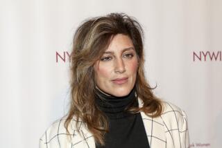 Jennifer Esposito in a white plaid suit jacket at the New York Women in Film and Television's 44th annual Muse Awards