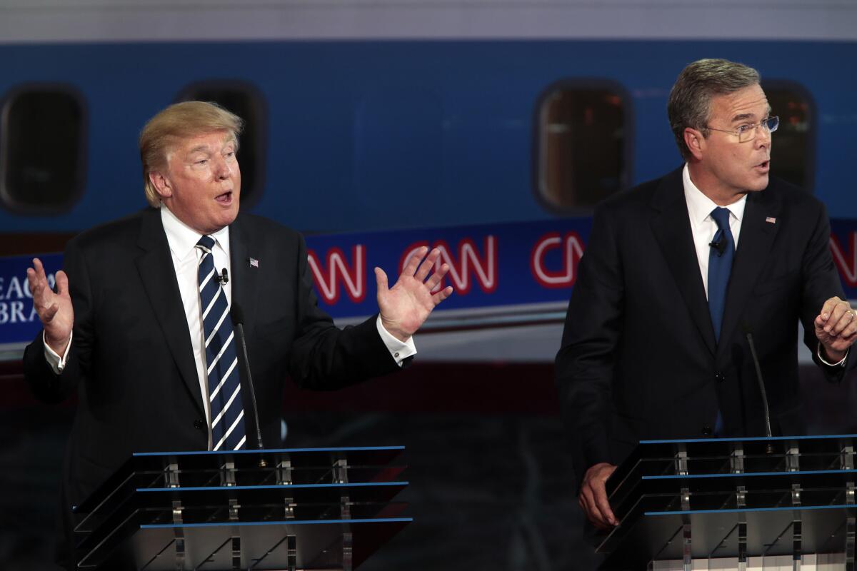 SIMI VALLEY, CA. -- WEDNESDAY, SEPTEMBER 16, 2015 -- Candidates Donald Trump and Jeb Bush square off during the 2015 Republican presidential debate held Wednesday at the Ronald Reagan Presidential Library in Simi Valley. ( Rob Gauthier / Los Angeles Times )