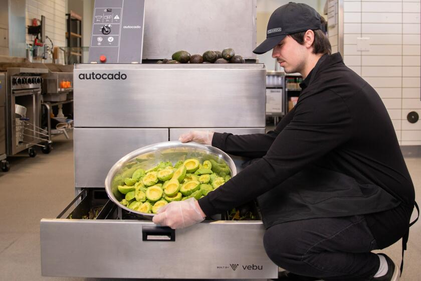 Autocado is a collaborative robot prototype that cuts, cores, and peels avocados.