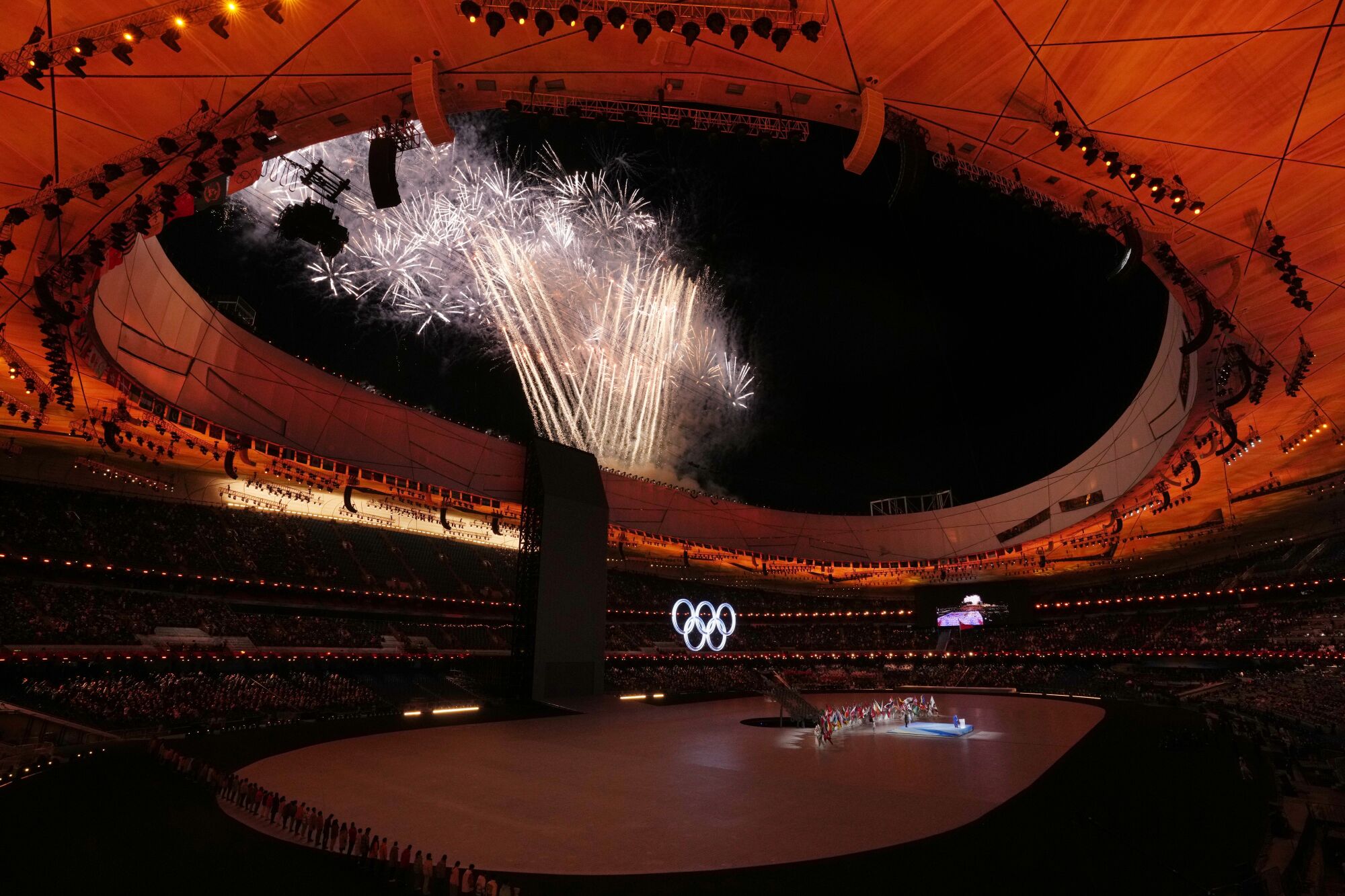 Fireworks burst above National Stadium, known as Bird's Nest, during the opening ceremony