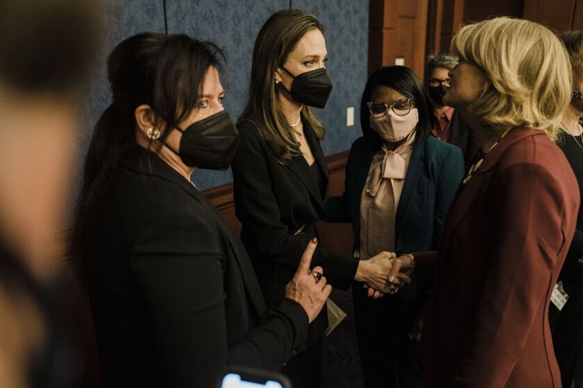 WASHINGTON, DC - FEBRUARY 09: Actress Angelina Jolie is greeted by Sen. Lisa Murkowski (R-AK) following a news conference on the bipartisan modernized Violence Against Women Act (VAWA) on Capitol Hill on Wednesday, Feb. 9, 2022 in Washington, DC. (Kent Nishimura / Los Angeles Times)