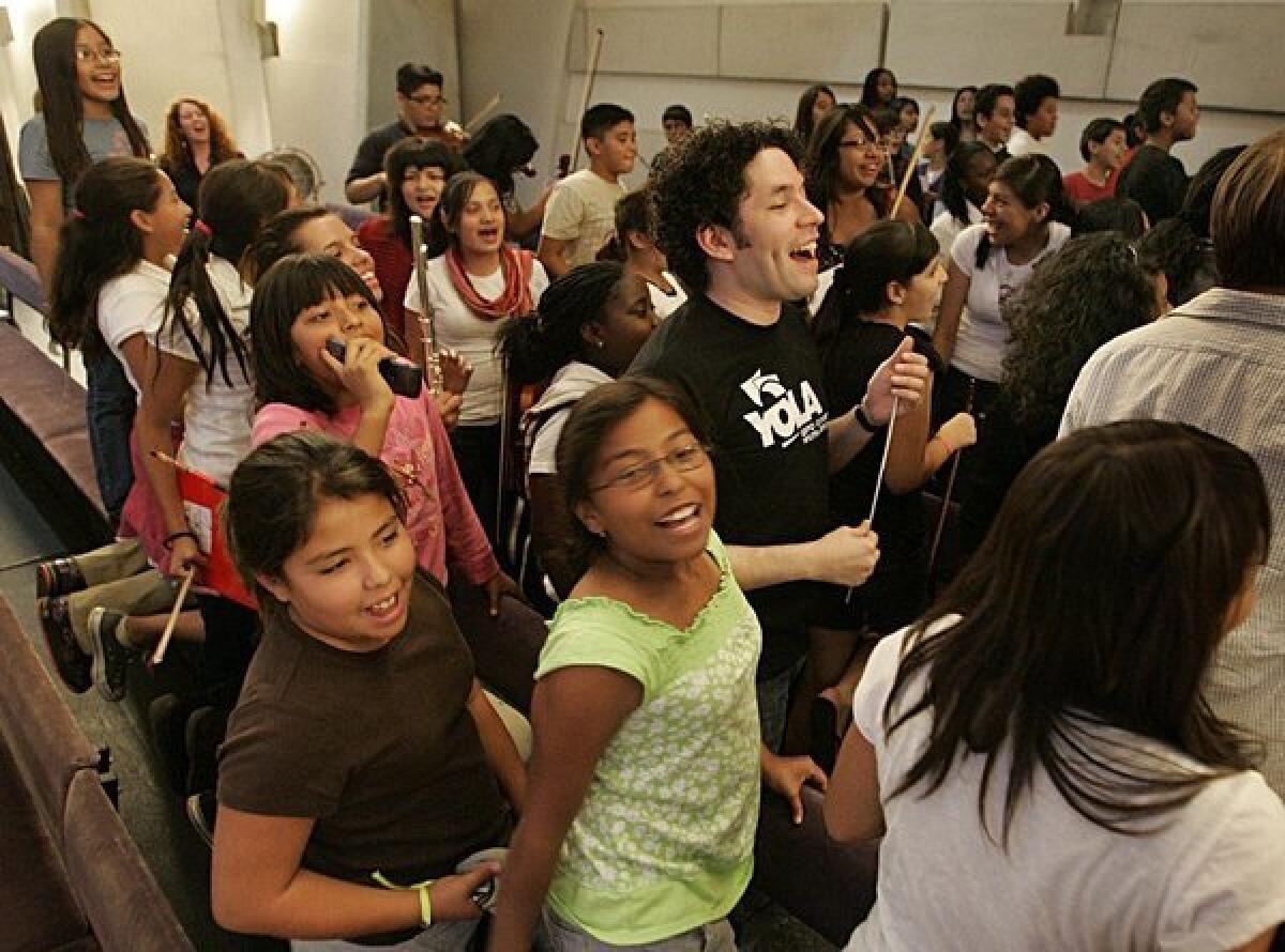 Conductor Gustavo Dudamel with music students in 2009.