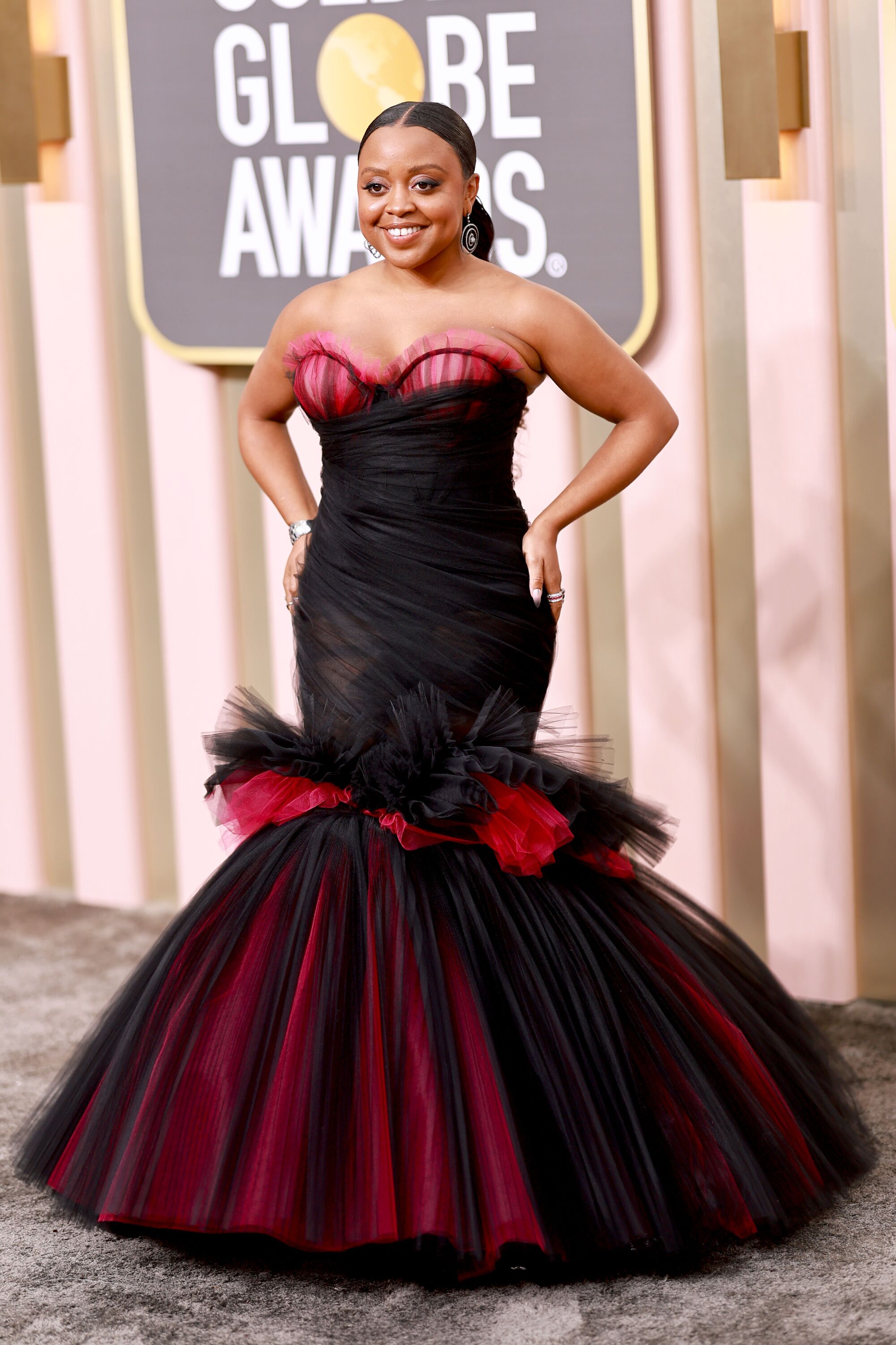 Quinta Brunson schools the Golden Globes in red carpet style.