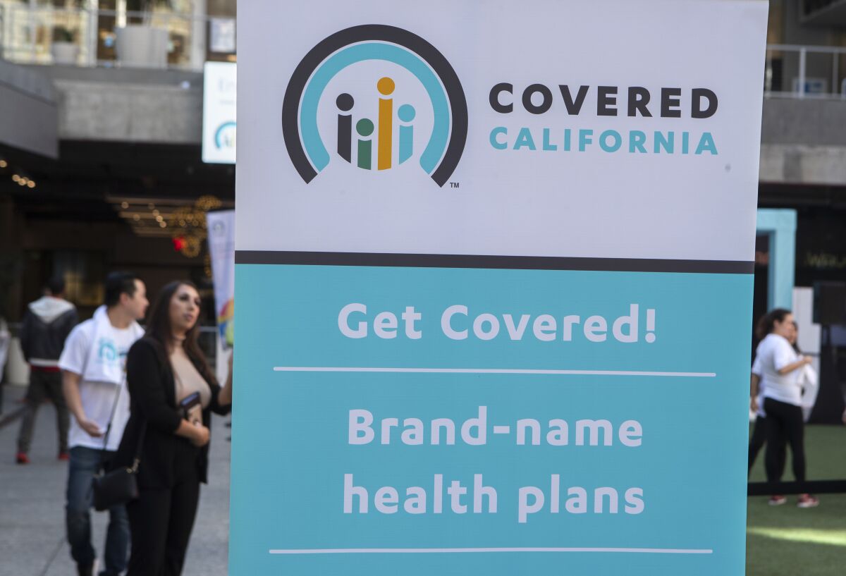 A banner promoting Covered California is displayed at The Bloc in downtown Los Angeles on Nov. 4, 2019.