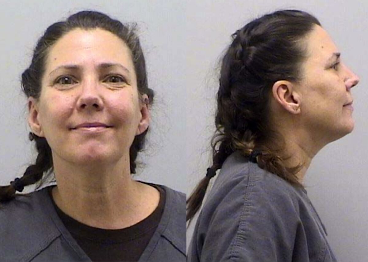 This undated booking photo provided by the Douglas County Sheriff's Office, in Colorado, shows Cynthia Abcug. Abcug, accused of working with supporters of QAnon to have her son kidnapped from foster care, can be put on trial, a judge ruled Thursday, Aug. 13, 2020. (Douglas County Sheriff's Office via AP)