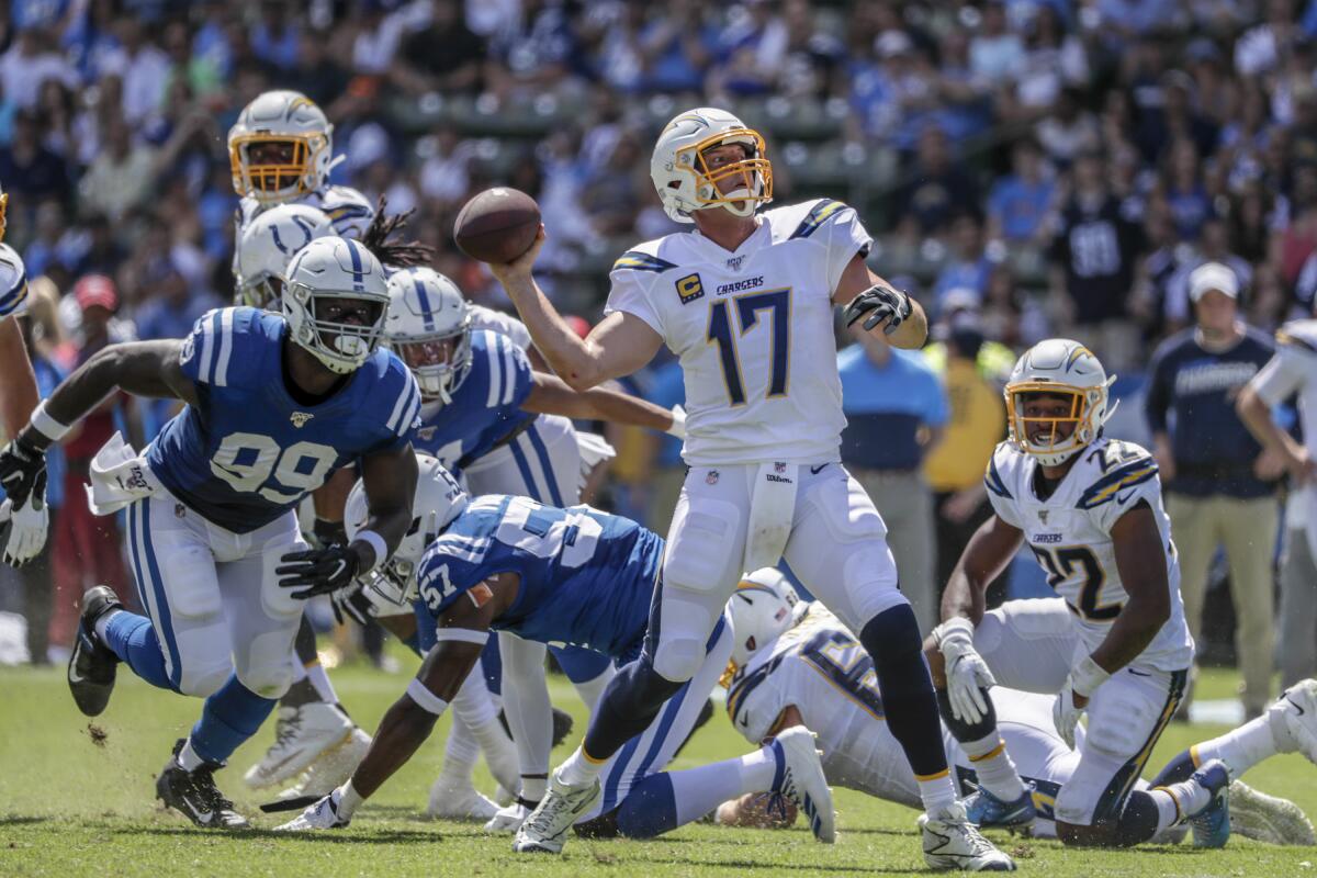 Chargers quarterback Philip Rivers launches a 28-yard touchdown pass to Keenan Allen.