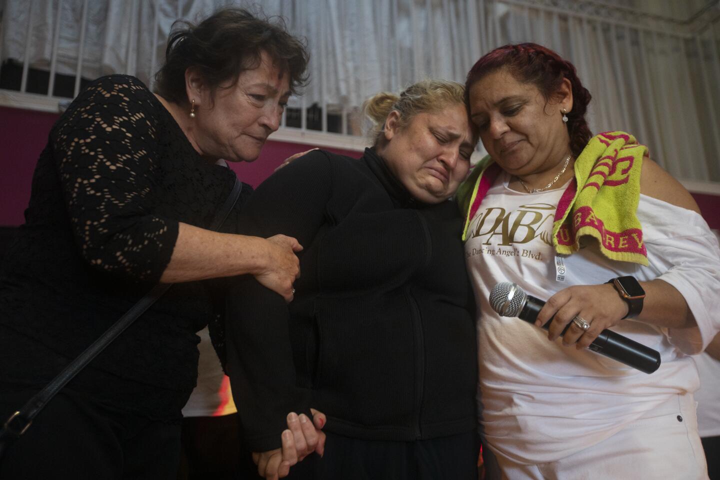 Grandmother Betzabe Vargas Fabes, 58, left, mother Lorena Pimentel de Salazar, middle, and Rocio Caetano, right, at a fundraising Zumba class in San Jose.