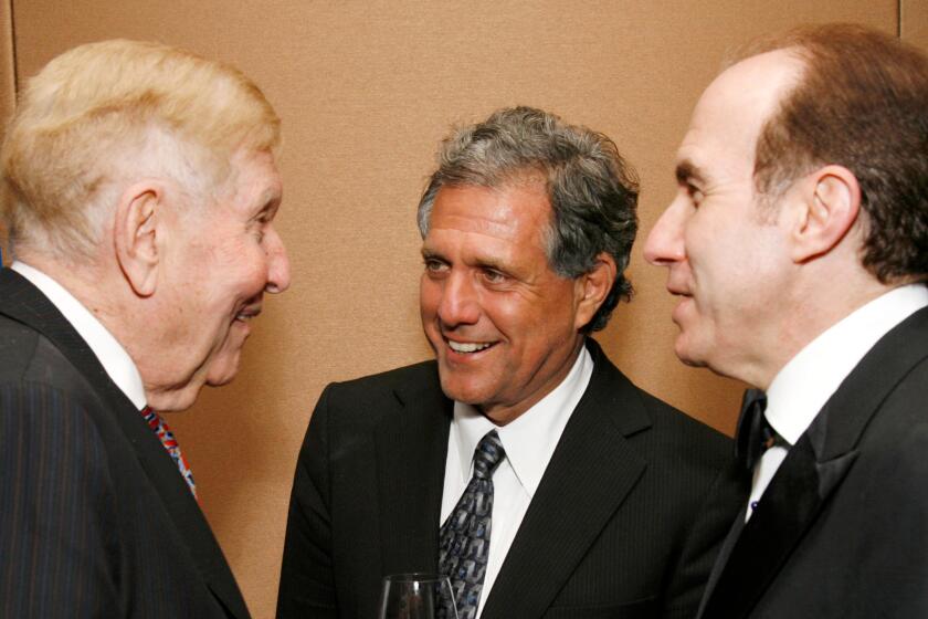 Viacom Chairman Sumner Redstone, left CBS Chief Executive Les Moonves and Viacom CEO Philippe Dauman attend the Phoenix House Public Service awards on June 5, 2007 in New York City.