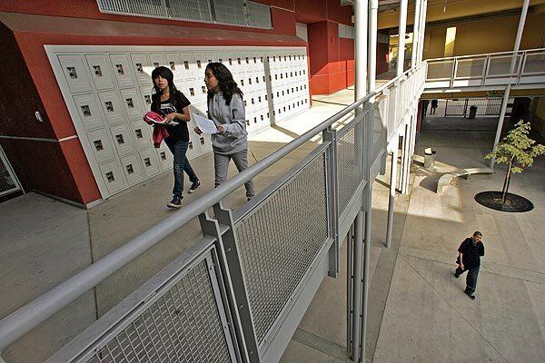 Students head to class at Felicitas and Gonzalo Mendez Learning Center in Boyle Heights on Nov. 5. The new high school was built to relieve Roosevelt High School in Boyle Heights of overcrowding. Some Mendez students are not fazed by the shift. They see the move as an opportunity to carve a new identity on the Eastside.