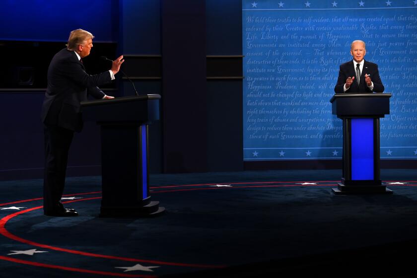 US President Donald Trump (L) and Democratic Presidential candidate and former US Vice President Joe Biden speak during the first presidential debate at the Case Western Reserve University and Cleveland Clinic in Cleveland, Ohio on September 29, 2020. (Photo by JIM WATSON / AFP) (Photo by JIM WATSON/AFP via Getty Images)