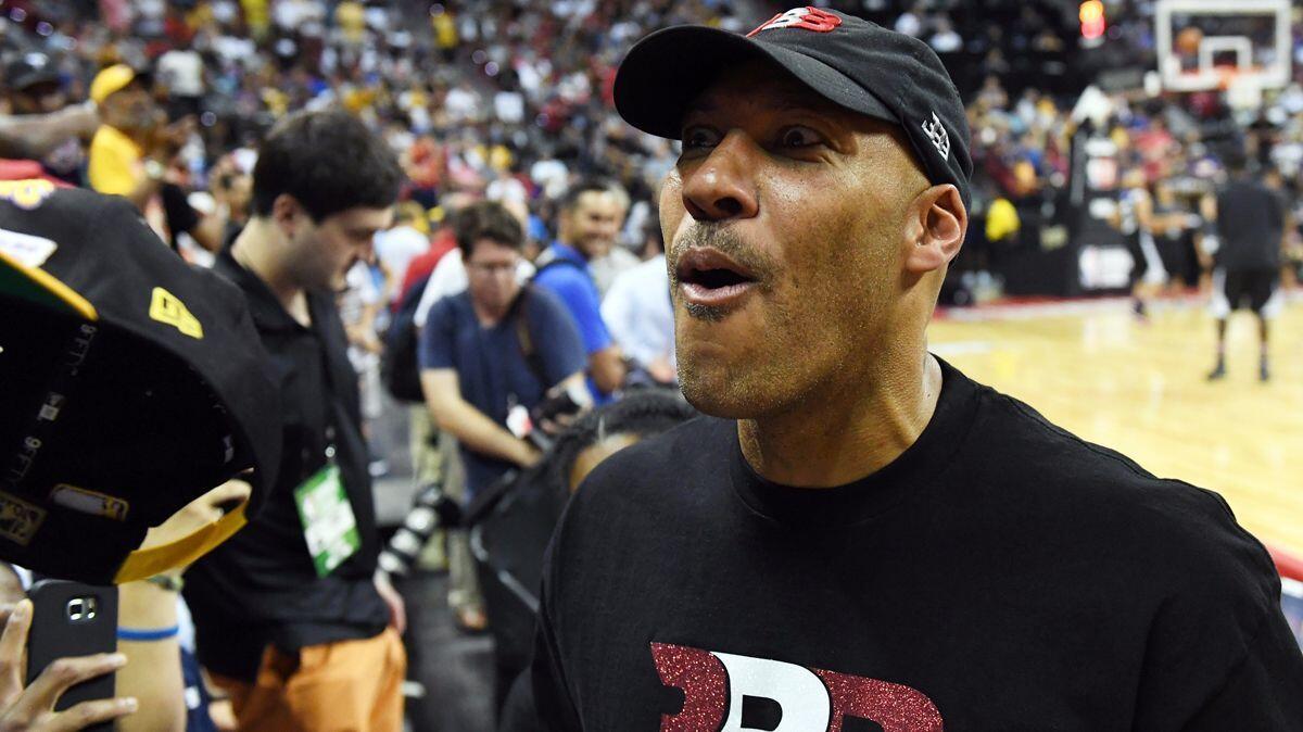 LaVar Ball jokes with fans at halftime of a Summer League game between the Lakers and the Clippers in Las Vegas on July 7.