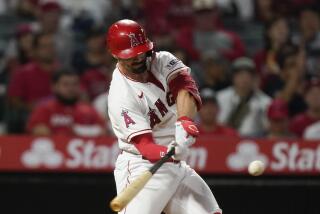 The Angels' Randal Grichuk hits a home run against the Orioles