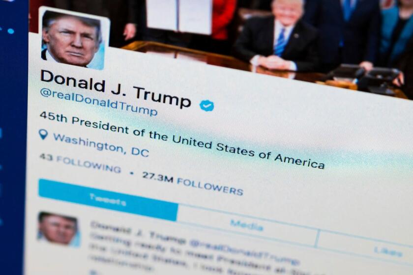 FILE- This April 3, 2017, photo shows President Donald Trump's tweeter feed on a computer screen in Washington. Some Twitter users say Trump is violating the First Amendment by blocking people from his feed after they posted scornful comments. Lawyers for two Twitter users sent the White House a letter Tuesday, June 6, demanding they be un-blocked from the Republican presidentâs @realDonaldTrump account. (AP Photo/J. David Ake, File)
