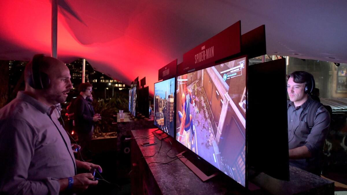 Guests experience the PlayStation E3 2018 Media Showcase at LA Center Studios.