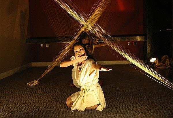 Jessica Emmanuel performs in the Heidi Duckler Dance Theatre company's "Cleopatra, CEO," a site-specific dance-theater production in a 51st-floor penthouse suite in downtown Los Angeles.