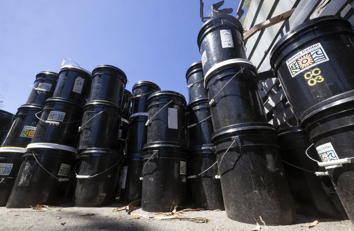 Buckets that people can use to fill up with their food scraps and then return for composting.