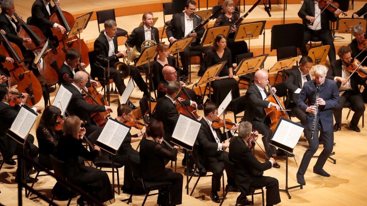 Martin Fröst plays, and dances, Mozart's Clarinet Concerto with the Los Angeles Philharmonic on Thursday night at Walt Disney Concert Hall.