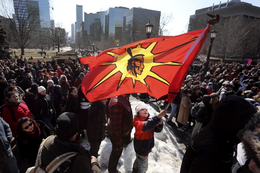 TORONTO, ON - FEBRUARY 22: As Wetsuweten Hereditary Chiefs visit blockades in Eastern Canada, thousands are took to Toronto streets in what could be the largest show of support in Toronto yet for the pipeline protesters in BC. The rally began at Queen's park and marched to City Hall for a large round dance. (Richard Lautens/Toronto Star via Getty Images)