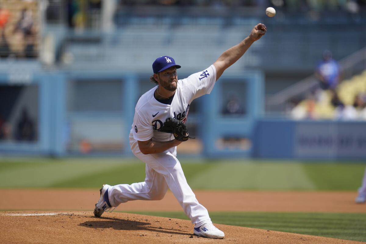 Dodgers pitcher Clayton Kershaw throws to a San Francisco Giants batter.