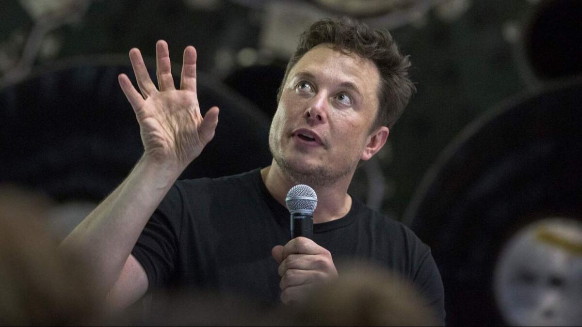 Tesla and SpaceX CEO Elon Musk speaks during a SpaceX event Monday.