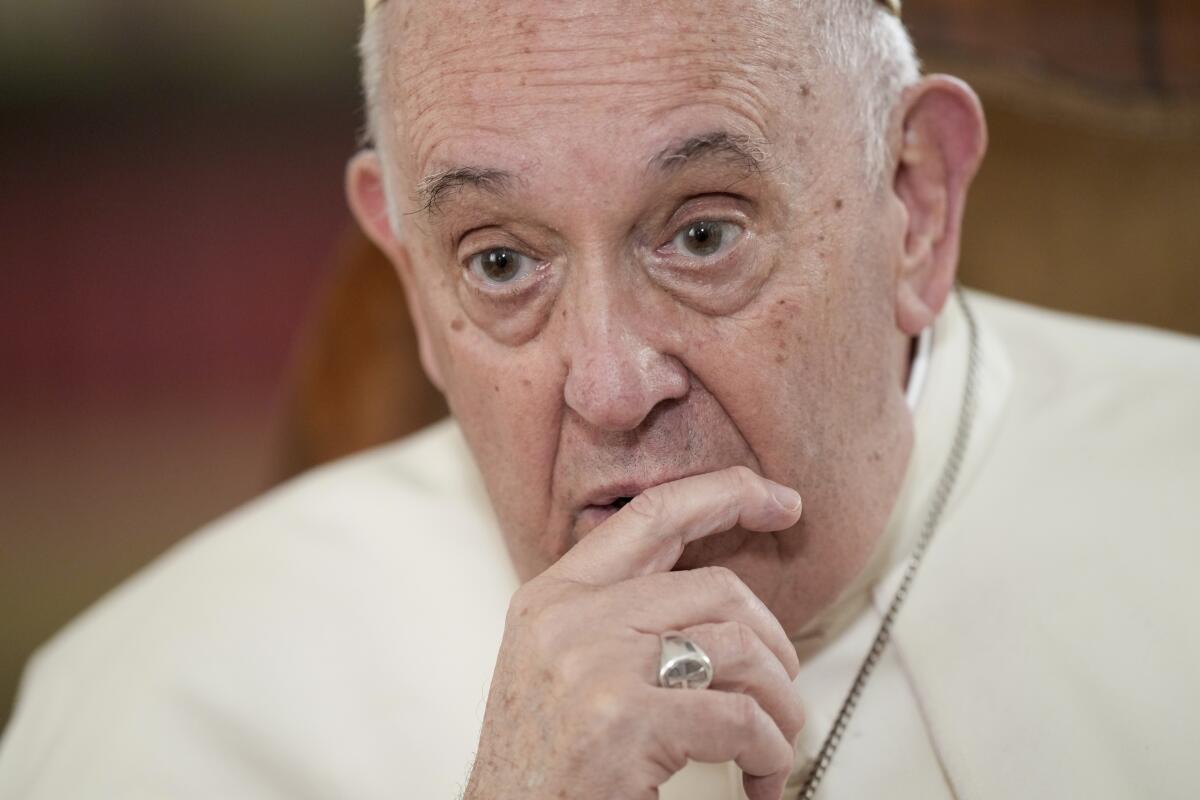 Pope Francis is shown in a close-up photo. 