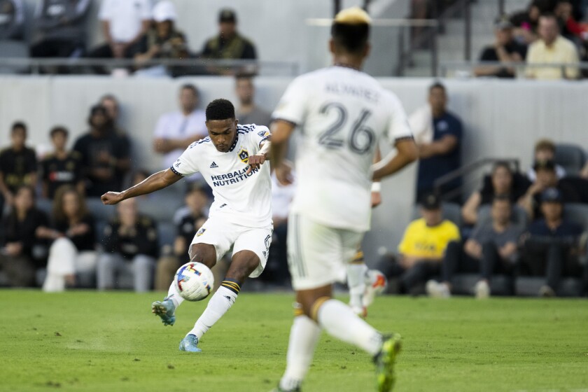 Galaxy midfielder Ryan Raveloson shoots during the first half against LAFC on July 8, 2022.