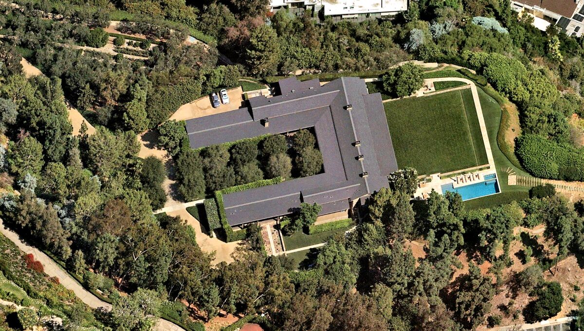 An aerial view of the 26,000-square-foot, U-shaped Tudor-style home on 6 acres in Beverly Hills.