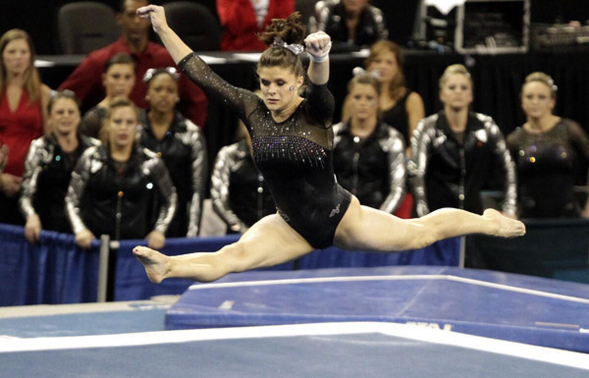 Georgia's Brandie Jay competes in the floor exercise at the NCAA women's gymnastics championship Friday at Pauley Pavilion