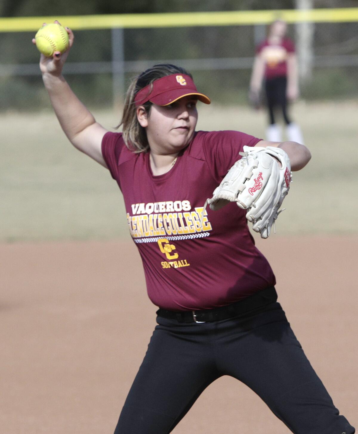 Glendale Community College softball player Reagan Atallah goes through a drill during a recent practice at the Glendale Sports Complex.