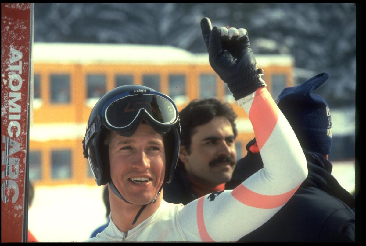 U.S. skier Bill Johnson celebrates after winning the men's downhill at the 1984 Winter Olympics in Sarajevo.
