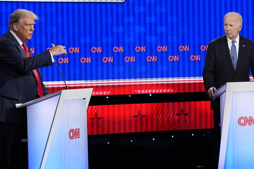 President Joe Biden, right, and Republican presidential candidate former President Donald Trump, left, participate in a presidential debate hosted by CNN, Thursday, June 27, 2024, in Atlanta. (AP Photo/Gerald Herbert)