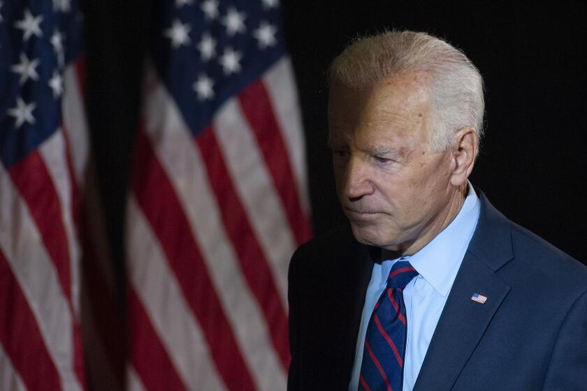 Former Vice President Joe Biden exits after making remarks about the DNI Whistleblower Report in Wilmington, Delaware.