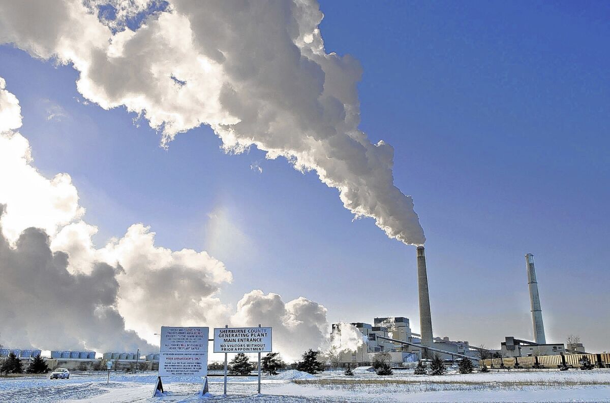 The Environmental Protection Agency, in announcing plans Monday to reduce power-plant emissions by 30% by 2030 from 2005 levels, estimated that the measure will cost up to $8.8 billion annually for compliance. Above, the Sherco power plant in Becker, Minn.