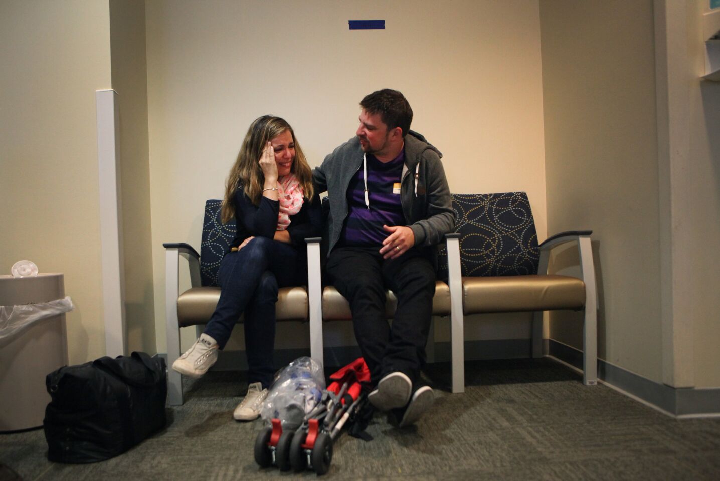 Sophie Gareau and husband Christophe Majkowski wait while their son Auguste is in surgery.
