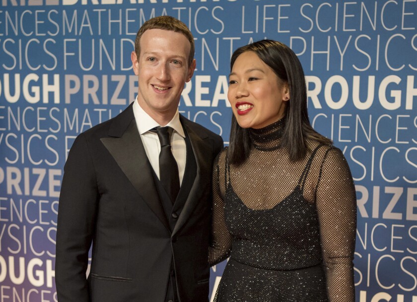 FILE - Facebook CEO Mark Zuckerberg and his wife Priscilla Chan arrive at the 7th annual Breakthrough Prize Ceremony at the NASA Ames Research Center on Sunday, Nov. 4, 2018, in Mountain View, Calif. The Chan Zuckerberg Initiative, or CZI, which runs the philanthropy of the couple, announced Tuesday, Dec. 7, 2021, that it is investing up to $3.4 billion to advance human health over 10 to 15 years, according to a spokesperson for the organization. (Photo by Peter Barreras/Invision/AP, File)