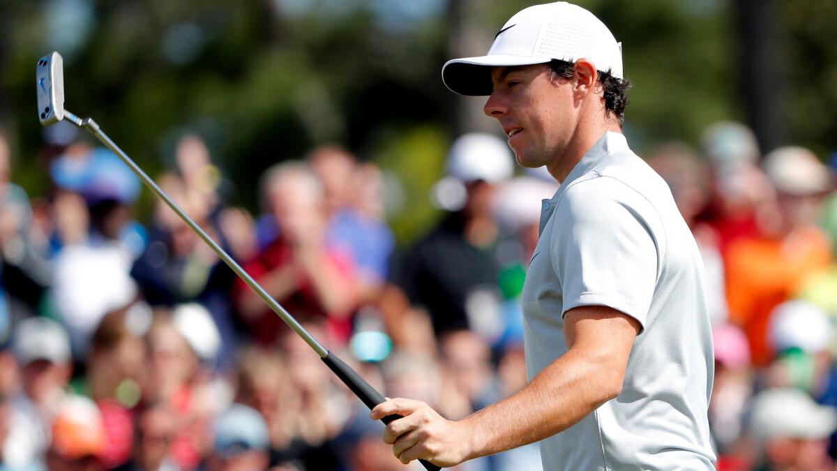 Rory McIlroy reacts Friday after making his par putt at No. 18 during the second round of the Masters.