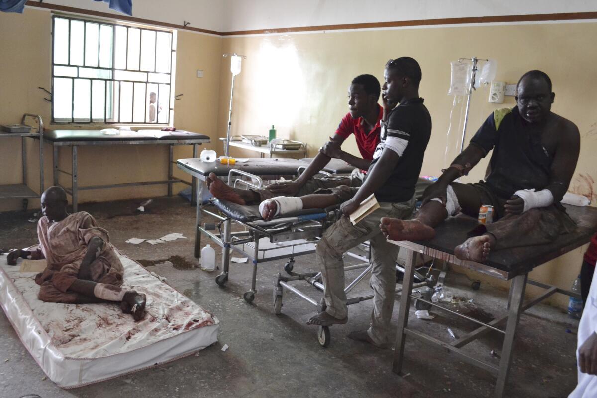 Nigeria's public hospitals are crowded and decrepit. Here, victims of a bomb attack in Maiduguri in 2015 await treatment in a public hospital.