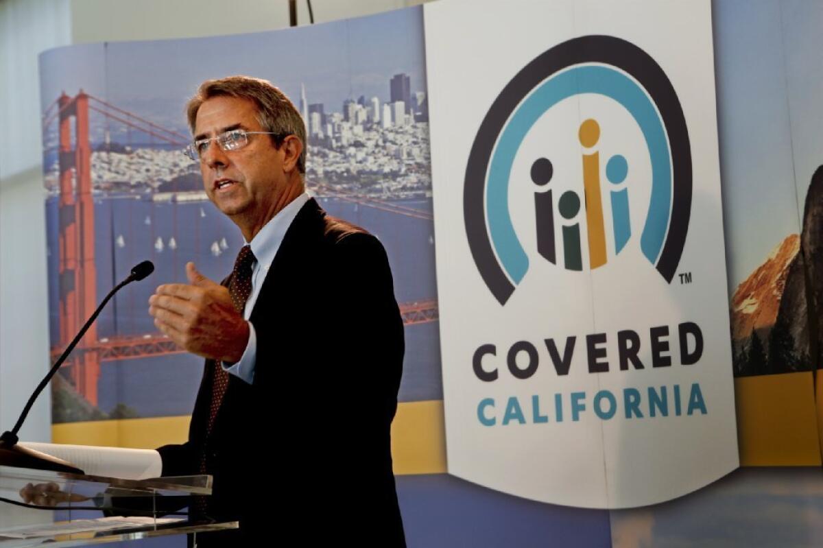 Covered California's executive director, Peter Lee, said termination notices are going out this week to about 10,000 people. Above, he speaks last month in L.A.