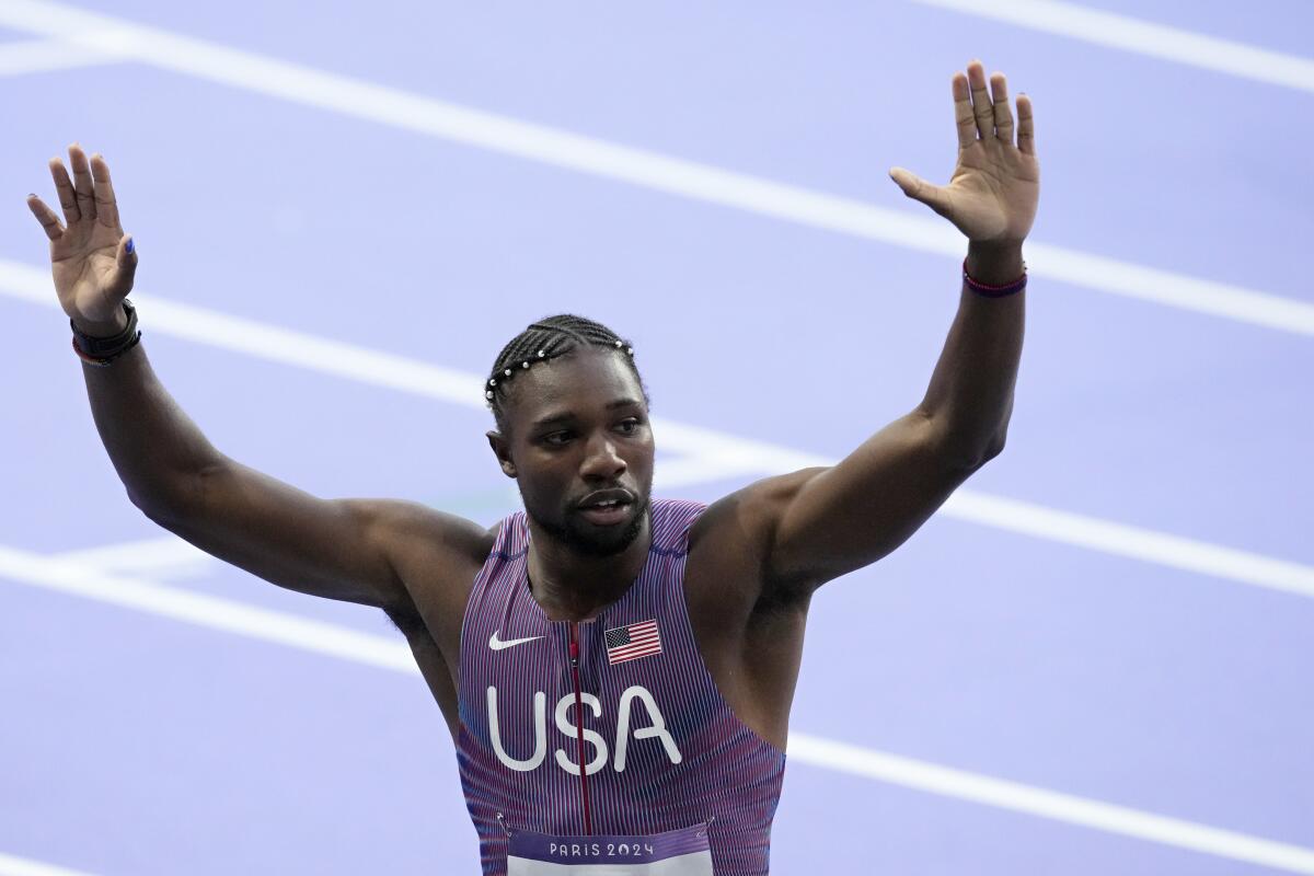 American Noah Lyles reacts after winning a men's 200-meter semifinal heat at the 2024 Summer Olympics Monday.