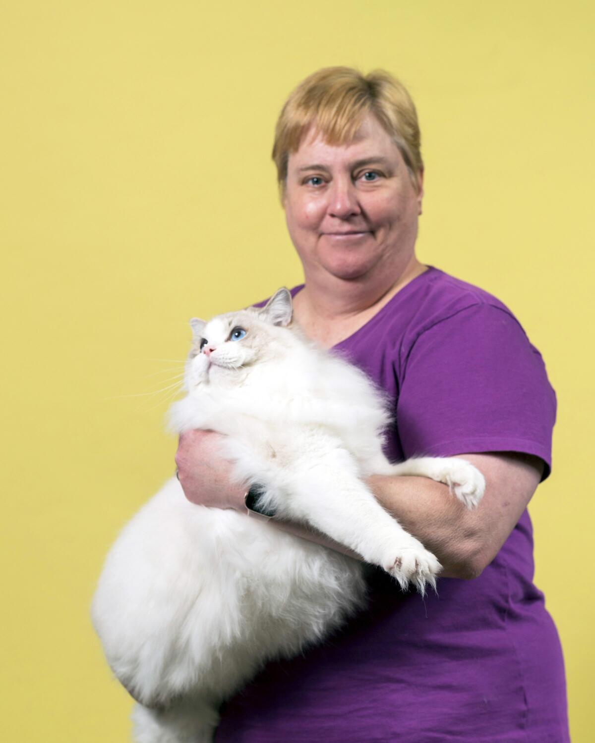 Karen Walsh of Hollister, Calif. holds her Ragdoll named Mateo at the 44th East of Eden Cat Fanciers.