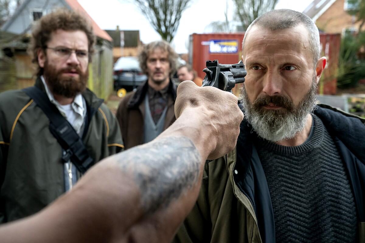 Nikolaj Lie Kaas, left, Lars Brygmann and Mads Mikkelsen in the movie "Riders of Justice." 