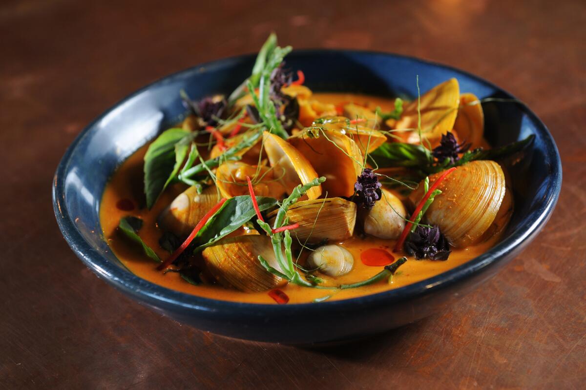 Turmeric and coconut curry with clams and sea beans, a creation of chef Louis Tikaram, from E.P. & L.P.