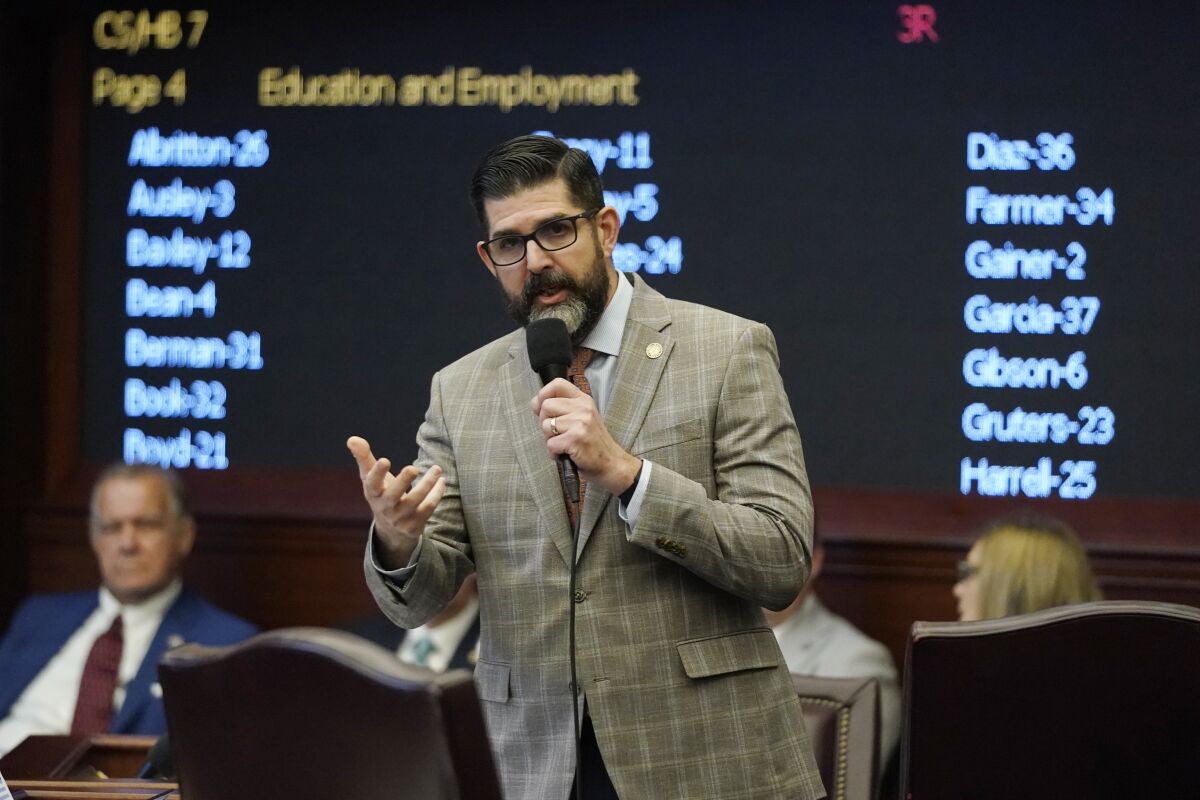 Florida Sen. Manny Diaz Jr., speaks for a bill during a legislative session at the Florida State Capitol, Thursday, March 10, 2022, in Tallahassee, Fla. (AP Photo/Wilfredo Lee)