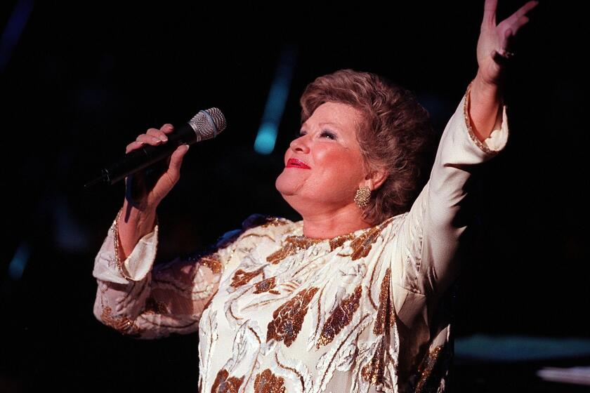 Singer Patti Page, pictured during a 1998 performance in Cerritos, died on New Year's Day at age 85.