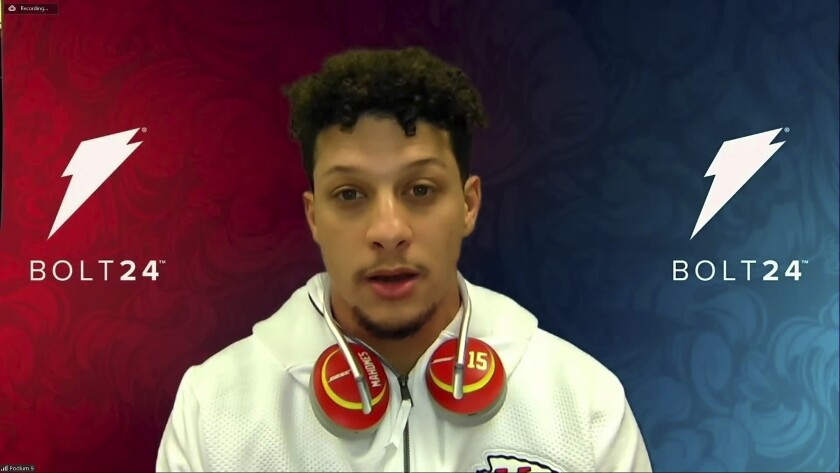 In this still image from video provided by the NFL, Kansas City Chiefs quarterback Patrick Mahomes (15) speaks during Opening Night for the NFL Super Bowl 55 football game Monday, Feb. 1, 2021. (NFL via AP)