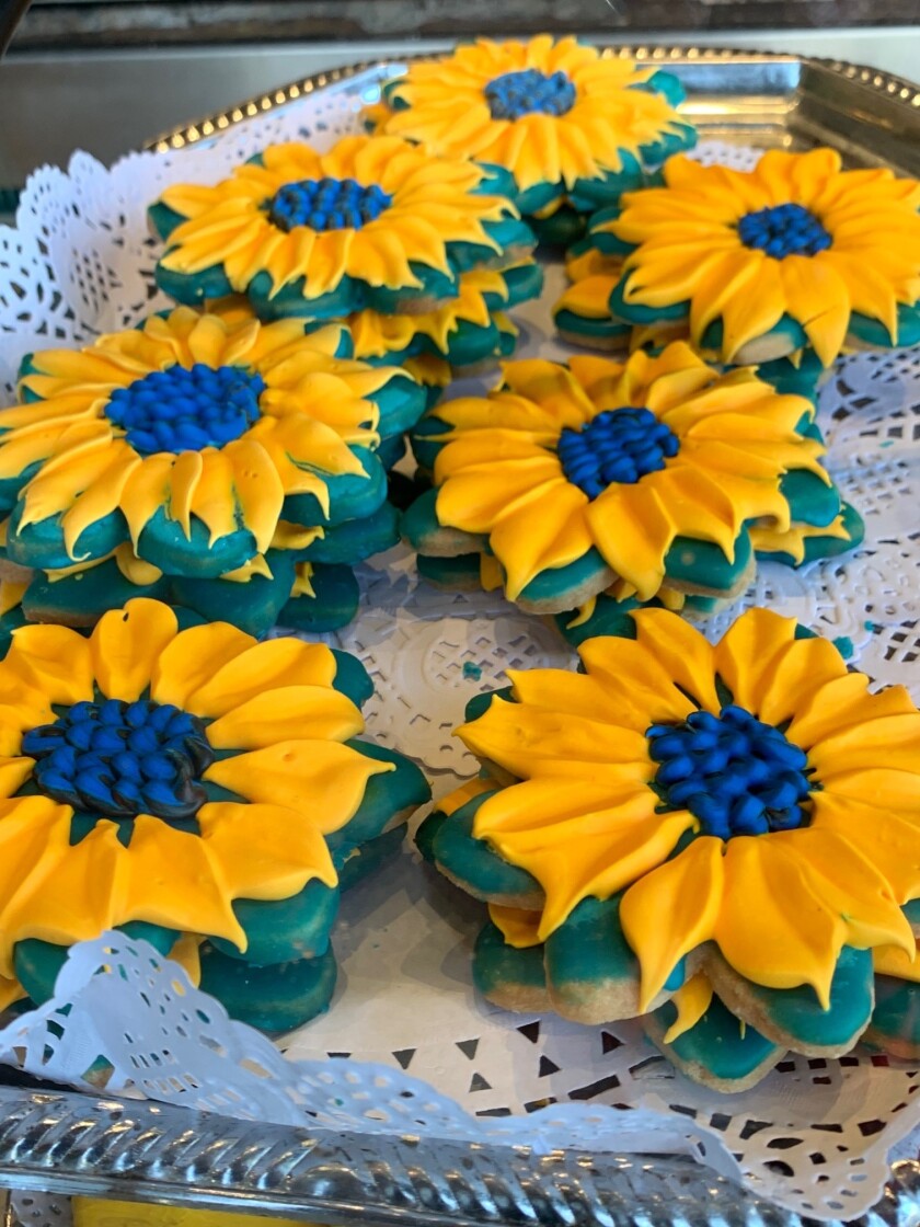 Girard Gourmet in La Jolla made blue-and-yellow sunflower cookies to show support for Ukraine after Russia's invasion.