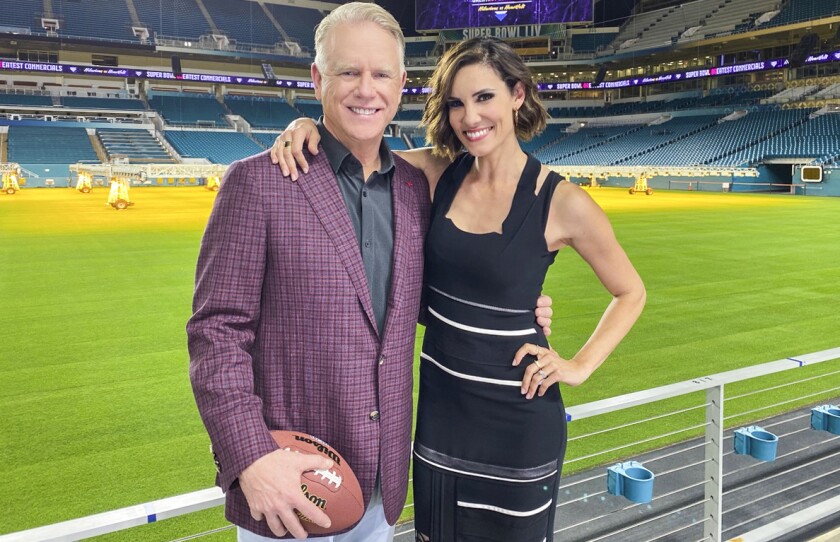 Boomer Esiason and Daniela Ruah in "Super Bowl Greatest Commercials 2020" on CBS.